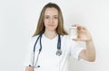 Medicine and health concept. Doctor woman holds pills in hands Royalty Free Stock Photo