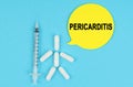 Syringe, human figure made of pills and paper sticker with the inscription - PERICARDITIS
