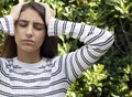 Medicine and Health Concept - Young woman with a headache Royalty Free Stock Photo