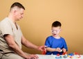 Medicine and health. happy child with father with stethoscope. family doctor. trust and values. father and son in