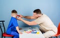 Medicine and health. happy child with father with stethoscope. small boy with dad play. Future career. father and son in Royalty Free Stock Photo