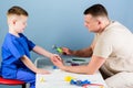 Medicine and health. happy child with father with stethoscope. small boy with dad play. pediatrician. father and son in Royalty Free Stock Photo