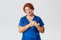 Medicine, healthcare and coronavirus concept. Touched and sympathetic redhead nurse, middle-aged doctor or physician in