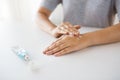 Close up of hands with cream or therapeutic salve