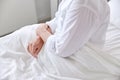 Lonely senior woman sitting in bed at hospital Royalty Free Stock Photo