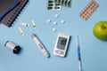 Medicine, healthcare, technology and online pharmacy concept. A diabetic measures your blood glucose