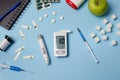 Medicine, healthcare, technology and online pharmacy concept. A diabetic measures your blood glucose