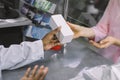 Medicine, pharmaceutics, health care and people concept. Cropped close up image of hands of African female pharmacist Royalty Free Stock Photo