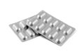 Medicine pills in aluminum foil strip on white background