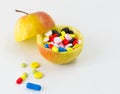 Medicine, pills of a different color fruits on the white background, drugs health Royalty Free Stock Photo