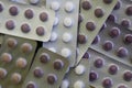 Medicine pills packed in blisters pack close-up