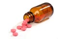 Medicine pills spilling from a bottle Royalty Free Stock Photo