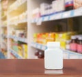 Medicine plastic bottle on table with pharmacy Royalty Free Stock Photo