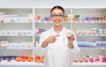 Asian female pharmacist or doctor with medicine Royalty Free Stock Photo