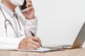 medicine, profession, healthcare and people concept - close up of doctor with clipboard. Royalty Free Stock Photo
