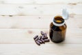 Medicine put on the pallet wood and in the brown glass bottle Royalty Free Stock Photo