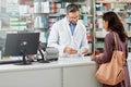 Medicine, service and help of pharmacist consulting at health store counter with expert knowledge. Medication advice and