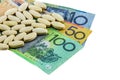 Medicine tablets on australia banknotes