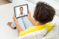 Patient having video chat with doctor on tablet pc Royalty Free Stock Photo