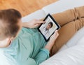 Patient having video chat with doctor on tablet pc Royalty Free Stock Photo