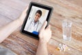 Patient having video chat with doctor on tablet pc Royalty Free Stock Photo