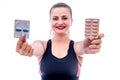 Medicine theme. Woman showing pills in blister isolated on white Royalty Free Stock Photo