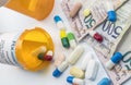 Medicines next to banknotes of Venezuela, shady deal of medication in full crisis of country of Latin America