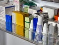 Medicines in packages, tubes and bottles are on the shelf of the refrigerator door. Medicines for the treatment of various Royalty Free Stock Photo