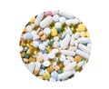 Medicines and Pills on a white plate. A pile of multi-colored tablets disguised as food on a plate with cutlery on a white plate. Royalty Free Stock Photo