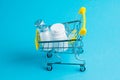Medicines in a shopping cart for a shopper. The concept of medicine and the cost of treatment