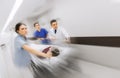 Medics and patient on hospital gurney at emergency Royalty Free Stock Photo