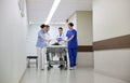 Medics and patient on hospital gurney at emergency Royalty Free Stock Photo