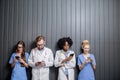 Medics with phones indoors