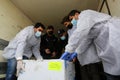 Medics and police officers check a shipment of the Russia`s Sputnik V vaccine for COVID-19 coronavirus disease