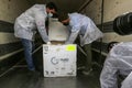 Medics and police officers check a shipment of the Russia`s Sputnik V vaccine for COVID-19 coronavirus disease