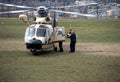 Medics rush an injured child to helicopter