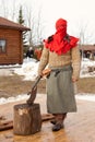 Medieval age executor with red hat and axe Royalty Free Stock Photo