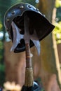 Medieval Ancient Halberd Weapon and Metallic Helmet Royalty Free Stock Photo