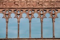 Medieval antique decorations with arches, carved lions and columns.