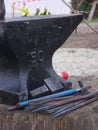 Medieval anvil and tools Royalty Free Stock Photo