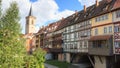 Medieval arch bridge KrÃ¤merbrÃ¼cke crossing river Gera with half-timbered shops and houses in the city of Erfurt, Germany