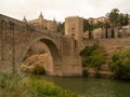 Medieval arch bridge on the Tagus River in Toledo City, Spain Royalty Free Stock Photo