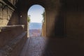 Medieval arched door in the old town of Pienza