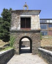 Medieval arched gateway entrance to Portomarin, Camino de Santiago, Spain.