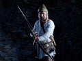 Medieval archer with a bow and arrows Royalty Free Stock Photo