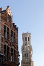 The medieval architecture of Bruges, details of the building and the tower Royalty Free Stock Photo