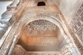 Medieval architecture example, Arabic patternes under arches of the 4th century palace Alhambra Royalty Free Stock Photo