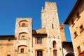 Medieval architecture in the Piazza della Cisterna square of San Gimignano, Italy Royalty Free Stock Photo