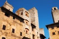 Medieval architecture in the Piazza della Cisterna square of San Gimignano, Italy Royalty Free Stock Photo