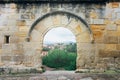 Medieval archway in a stone brick wall